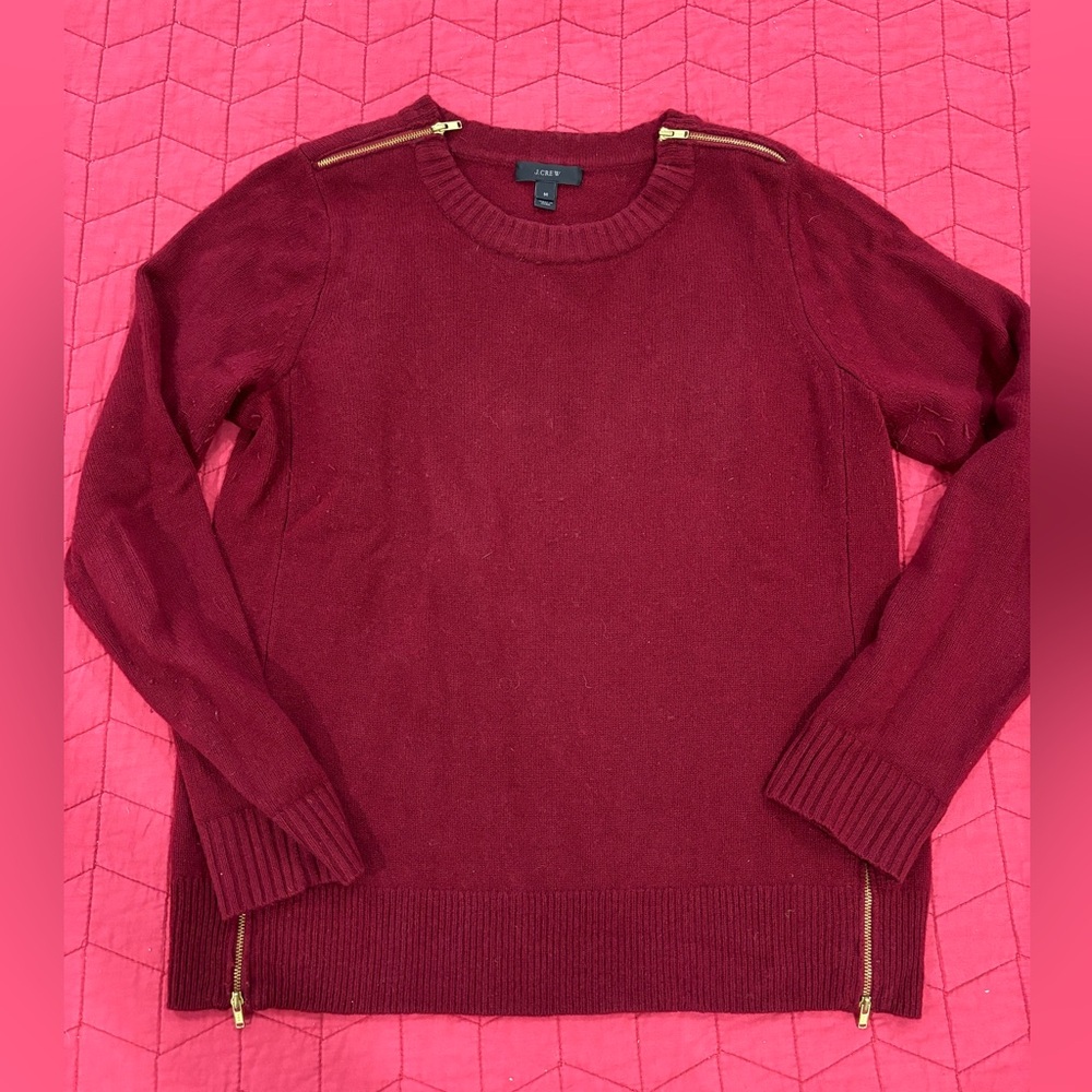 J.Crew burgundy sweater with gold zippers. Size medium.